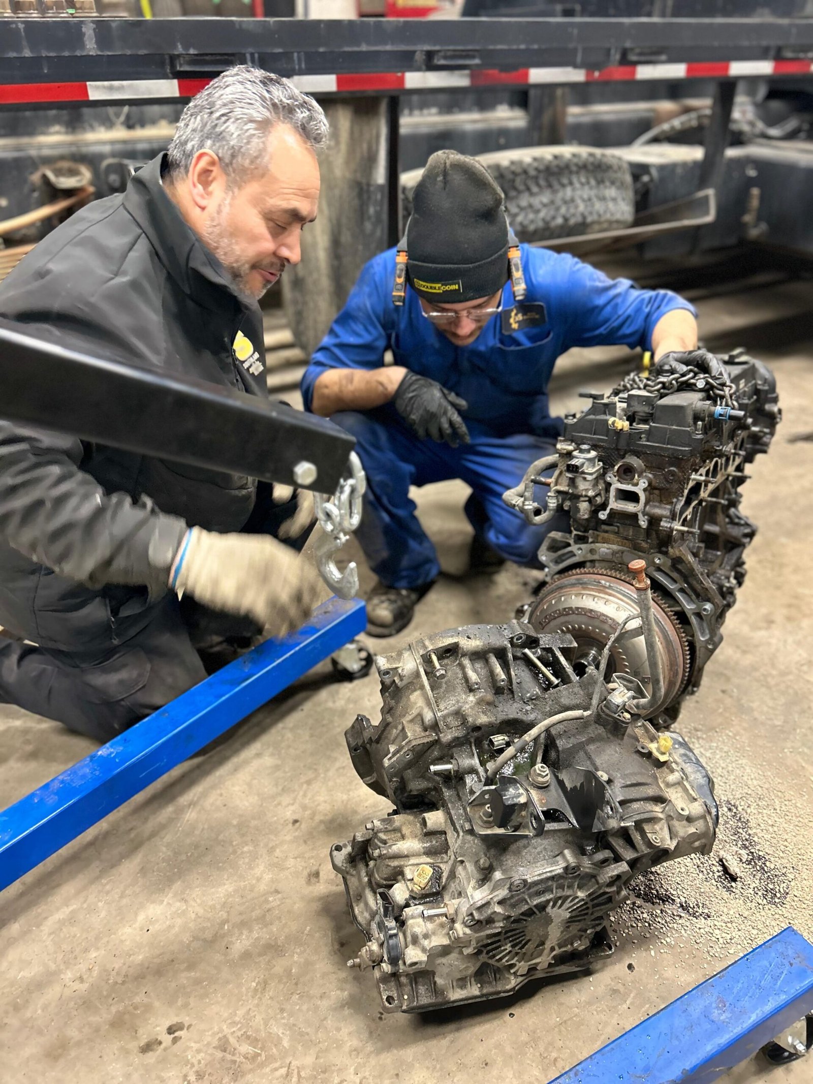 Transmission Repair Service – C&S Auto Repair Edmonton Mechanics performing automatic transmission repair in Edmonton — transmission case and torque converter being serviced.